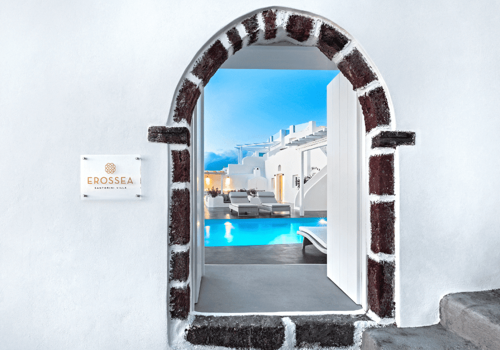 Breathtaking view from Erossea Villa in Oia, capturing the sea and Santorini's stunning landscape against a clear sky