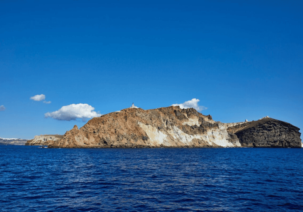 A rocky island surrounded by ocean waters