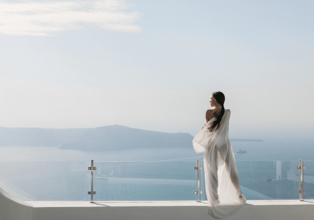 An elegant photograph taken at Erossea Villa in Santorini, featuring breathtaking views and a charming atmosphere